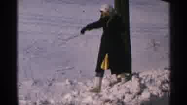 Minnesota USA (1965): 55 Years Ago Woman Trudging In Snow As Cat Looks On