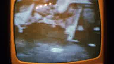 Minnesota USA (1965): A Small Television Screen Shows A Man In A Hat And Garbage