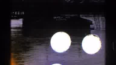 Minnesota USA (1965): Water Rushes By The Building And Crates White Misty Swirls