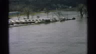 Minnesota USA (1965): Boats Float And Trees Stand And Flooded Waters