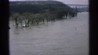 Minnesota USA (1965): River Current Near Bridge Over River And Industrial Area