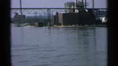 Minnesota USA (1965): Factory Building By Water On A Clear Sunny Day