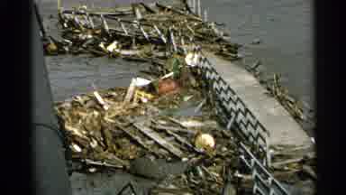 Minnesota USA (1965): Trash On Black River Near Grey Street With Small White House