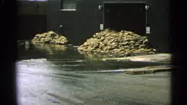 Minnesota USA (1965): Firefighters Station Left The Hoses Running With Water On