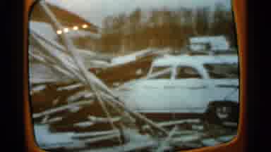 Minnesota USA (1965): Orange Vintage Television Showing Natural Disaster Damage