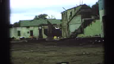 Minnesota USA (1965): A Devastated House Surrounded By Debris And A Car Parked