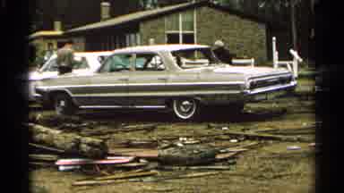 Minnesota USA (1965): The White Middle Aged Men Are Seen To Be Standing Near A
