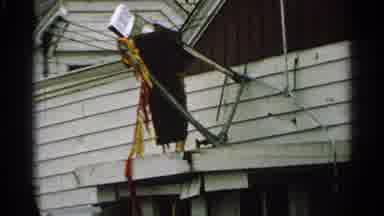 Minnesota USA (1965): A Building Is Show There Is Evidence Of Structural Damage