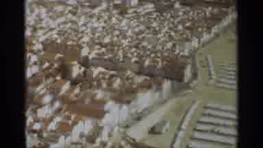 NAZARE PORTUGAL-1965: Aerial View Showcasing Houses Next To A Beach With Umbrellas