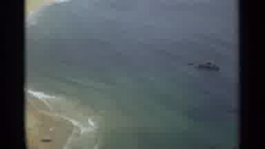 NAZARE PORTUGAL-1965: Boats Sailing Near Beach And Old House