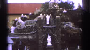 Saint Louis Missouri (1965): A Decorative Statue Is Shown A Goose Swims In A Pond