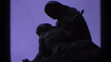 Saint Louis Missouri (1965): A Man Takes A Photo Of A Stone Statue Of The Madonna