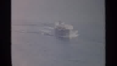 Sicily-1965: Motorboat Speeding Across the Sea with Sicily Sign