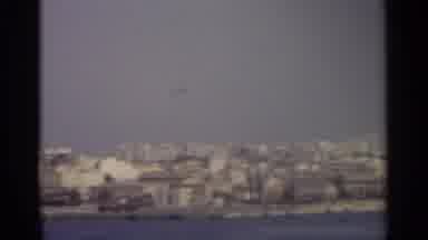 Sicily-1965: The Large City Along The River Is Crowded With Buildings
