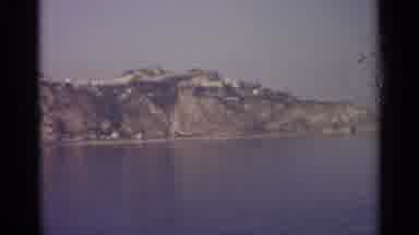 Sicily-1965: Vintage Film Captures A Peaceful Lake And Cliffside