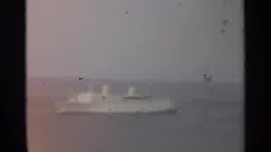 STOCKHOLM SWEDEN-1965: White Ship At Sea On A Cloudy Day