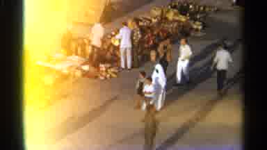 TANGIER MOROCCO-1965: Open Market With Shoppers And Vendors In North Africa