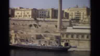 Tangier Morocco (1965): Barge Boats Are Docked At The River's Edge Beside Yellowed