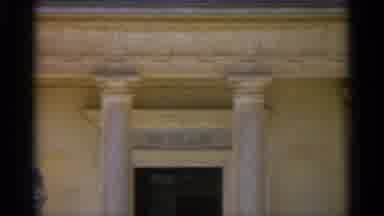 TANGIER MOROCCO-1965: Man Walks Out Of Greek Architectural Museum