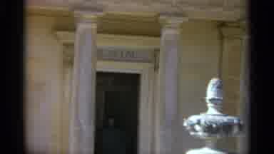 TANGIER MOROCCO-1965: Museum Entrance With Stone Columns And White Marble Sculpture