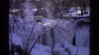 Hamel Minnesota (1966): A Very Icy Landscape With A Waterfall And Snow Primarily