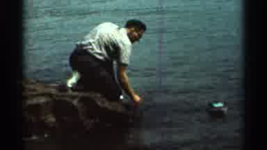 Hamel Minnesota (1966): Man Set A Toy Boat Afloat