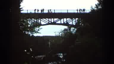 Hamel Minnesota (1966): People Walking And Having Barbecue On A Very High Bridge