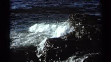 Hamel Minnesota (1966): Ocean Waves Crashing Onto Shoreline Rocks During The Day