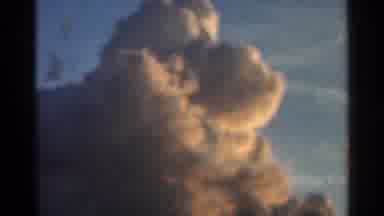 Hamel Minnesota (1966): A Cumulonimbus Cloud In The Sky Followed By A Stratus