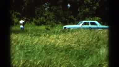 Hamel Minnesota (1966): Man Near Parked Classic Car Takes Nature Photos Then Walks