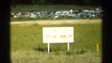 Hamel Minnesota (1966): Turquoise Car Parked In Tall Grass On A Bright Sunny Day