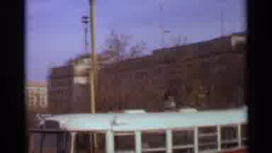 Moscow Russia-1966: Buses Parked Near Soviet-Era Building With Autumn Trees