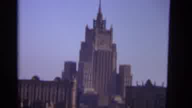 Moscow Russia (1966): Hand Held Very Tall Brown Building Followed By Two Twin