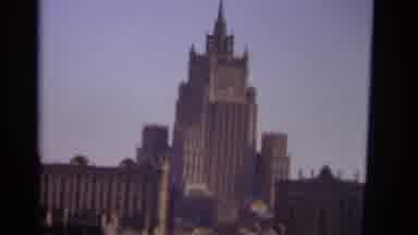 MOSCOW RUSSIA-1966: A Stalinist Skyscraper and Women on a Street
