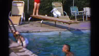 US Virgin Islands (1966): Man And Kid Playing In Swimming Pool And Woman Behind