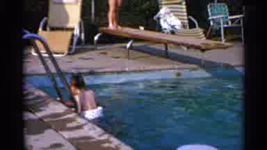 US Virgin Islands (1966): Father And Child Swimming In A Pool Next To A Diving