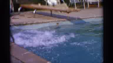 US Virgin Islands (1966): Female Splashes In The Pool And Boy Child Runs Along