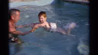 US Virgin Islands (1966): Young Boy Having Fun Learning To Swim In A Swimming Pool