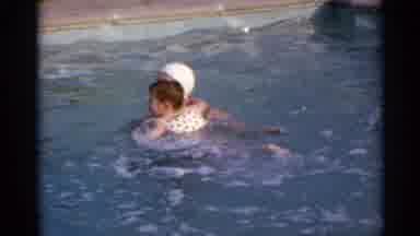 US Virgin Islands (1966): Women Swimming In A Pole While Holding A Small Red