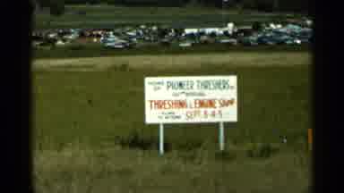 Wauseon Ohio (1966): A Sign In The Middle Of A Large Field Advertising A Show In