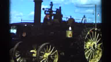 Wauseon Ohio (1966): Two Men In Summertime Looking At An Old Steam Engine