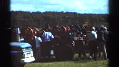Wauseon Ohio (1966): People Crowded And Smoke Coming Out
