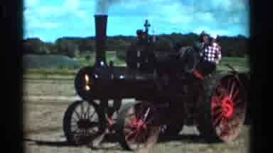 Wauseon Ohio (1966): I Train Engine Tractor Pulling A Plow In A Field On A Sunny