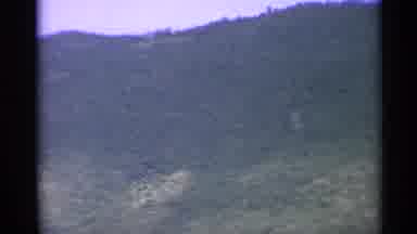 US Virgin Islands (1967): A Mountain And A Large Boat In A Bay