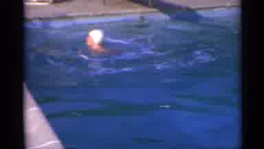 US Virgin Islands (1967): Young Girl Slowly Swimming Over To A Ladder To Get Out