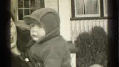 Danielson Connecticut (1939): A Small Baby Being Caressed Gently By His Mother