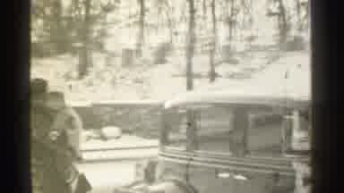 Danielson Connecticut (1939): Mother Holding Her Child Walking Next To A Car
