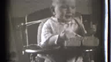 Danielson Connecticut (1939): A Baby Sitting In A Chair Smiling Then Someone Tried