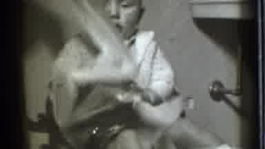 Danielson Connecticut (1939): Toddler Sitting On Potty Chair Pulling Out Yards Of