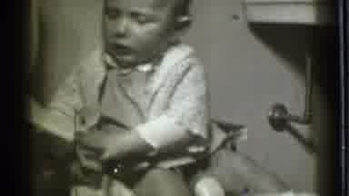 Danielson Connecticut (1939): A Baby That Is Pulling Toilet Paper Off The Roll